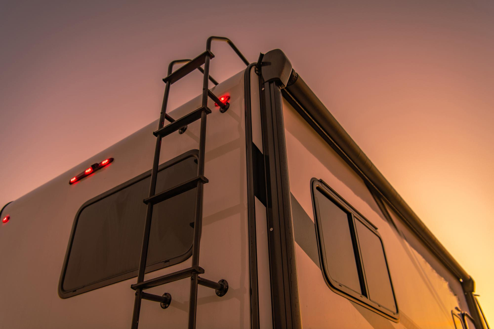View of a camper at sunset